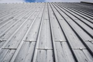 How Do You Cool Seal a Metal Roof? metal roof coating techniques