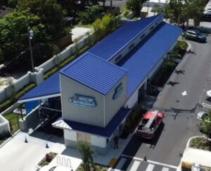 a commercial car wash building with a new metal roof